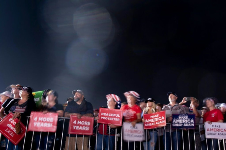 Supporters listen to US President Donald Trump speak during a campaign rally at the Minden-Tahoe airport in Minden, Nevada on September 12, 2020