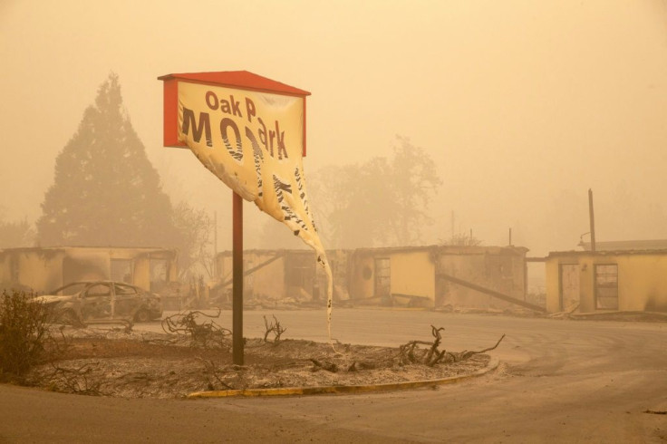 The Oak Park Motel's melted sign was destroyed in the Beachie Creek Fire in Gates, Oregon