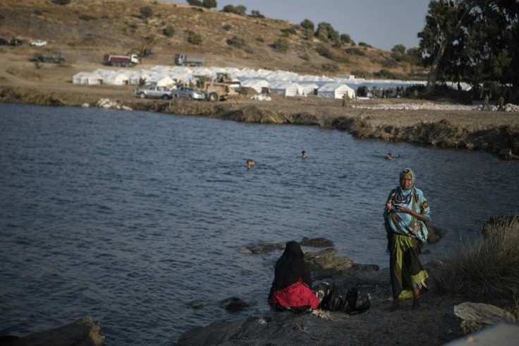 Authorities are erecting the new camp of white tents in haste near the eastern port-village of Panagiouda