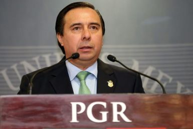 Tomas Zeron (pictured in a September 2015 handout photo), who was head of Mexico's Criminal Investigation Agency, is wanted over allegations of serious irregularities in the probe into one of the country's worst human rights tragedies