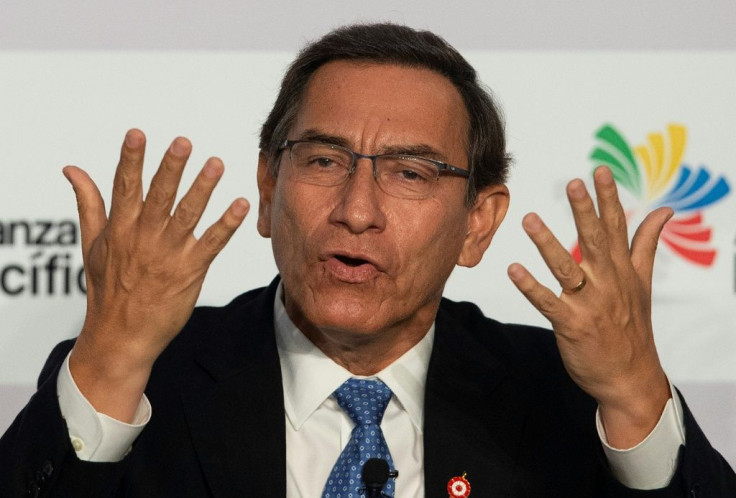 Vizcarra gestures during a speech to the Pacific Alliance Summit in Lima in 2019