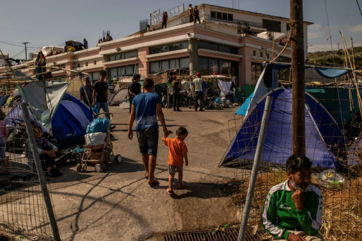 Thousands of migrants have been left to wander aimlessly around the island for days