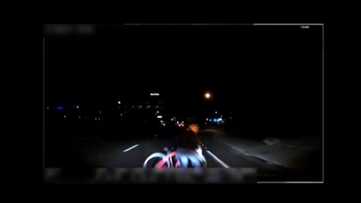 A video grab made from dashcam footage shows the moment before the collision of ride-sharing Uber's self-driving vehicle and a pedestrian killed in Tempe, Arizona in 2018