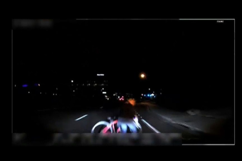 A video grab made from dashcam footage shows the moment before the collision of ride-sharing Uber's self-driving vehicle and a pedestrian killed in Tempe, Arizona in 2018