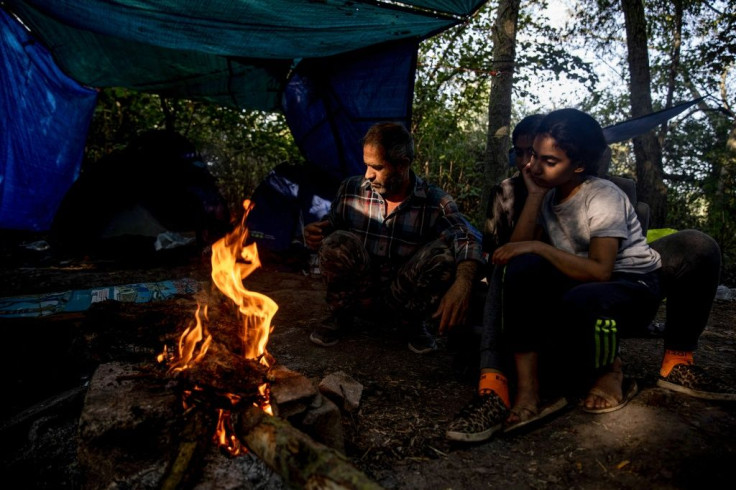 A waiting game: Falah and his daughters await the green light from the people-smuggler at any moment