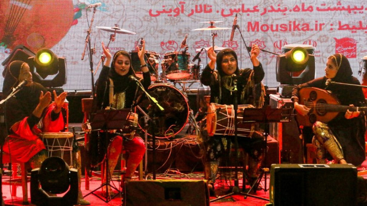 Dingo is an Iranian band made up of four women who play "bandari" music whose lyrics come from ancient folkloric songs