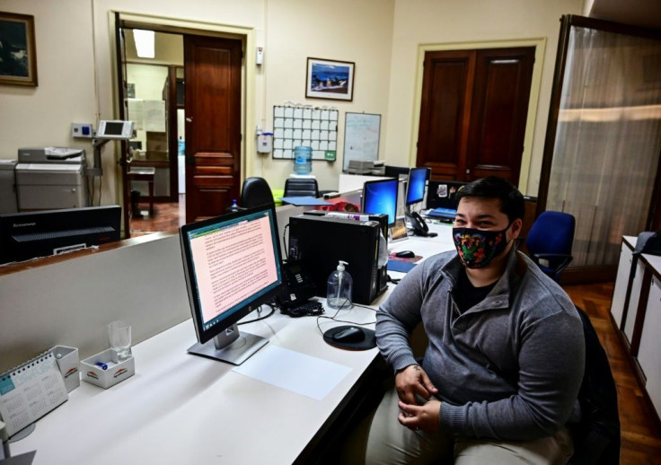 Thomas Casavieja pictured at a branch of Argentina's Banco Nacion in Buenos Aires where he works, in September 2020