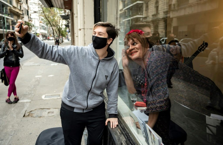 Argentine performance artist Susy Shock (R) poses for a picture at the MU Cultural Center in Buenos Aires in September 2020