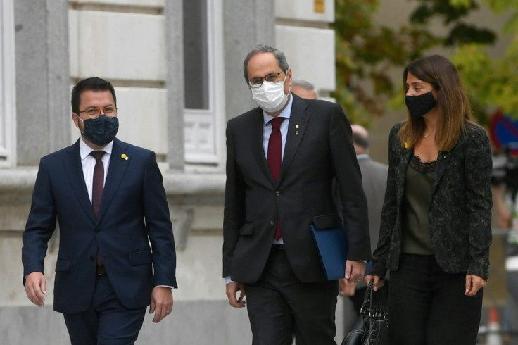Quim Torra, seen here in a white mask arriving at the Supreme Court, denounced the trial as "aberrant and grotesque"
