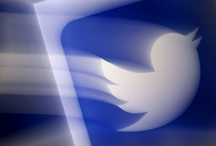 (FILES) In this file photo illustration, a Twitter logo is displayed on a mobile phone on August 10, 2020, in Arlington, Virginia.