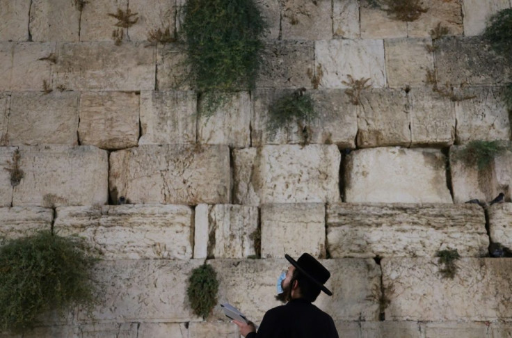 An ultra-Orthodox Jew prays at Jerusalem's Western Wall hours before a second coronavirus lockdown goes into force across Israel coinciding with the Jewish high holidays