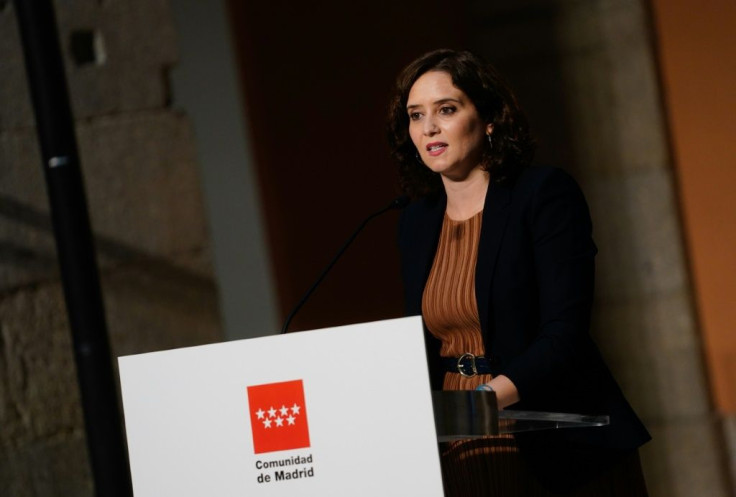 This handout picture by the Comunidad de Madrid (Madrid regional government) shows Madrid's regional president Isabel Diaz Ayuso giving a press conference to announce partial lockdown measures on nearly one million people to try to slow the spread of the