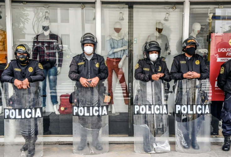 Police stand guard near Congress in Lima as Peru's President Martin Vizcarra faced an impeachment vote