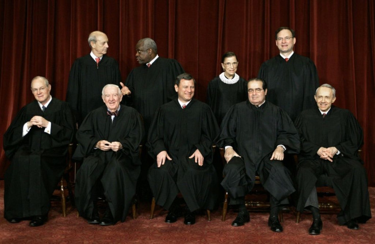 Ruth Bader Ginsburg (back row, 3rd from L) formed an unlikely friendship with fellow justice Antonin Scalia (front row, 4th from L), which was put on stage in the comic opera "Scalia/Ginsburg" -- they are seen here in 2008