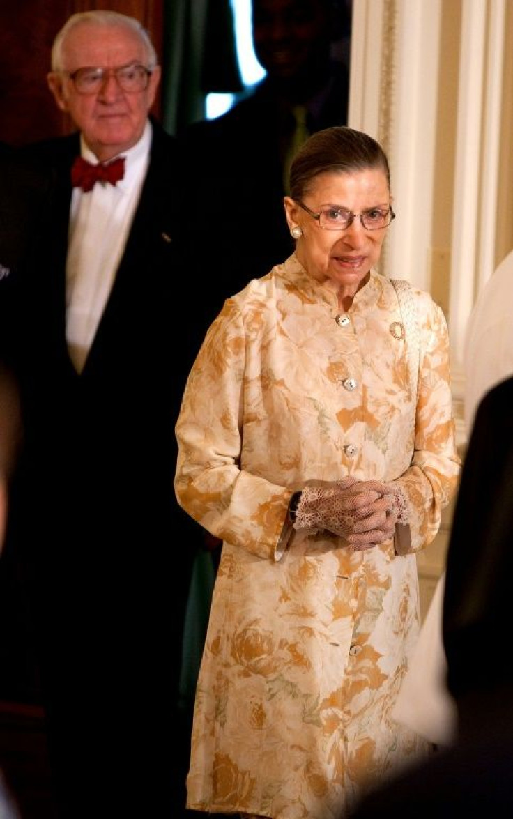 When asked about retirement, Ruth Bader Ginsburg (R) would cite the example of her former colleague John Paul Stevens (L), who worked on the court until the age of 90 -- the pair are seen here at a White House reception in 2009