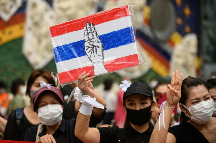 Activists rallied outside Shibuya station in Tokyo in support of the  Bangkok protests