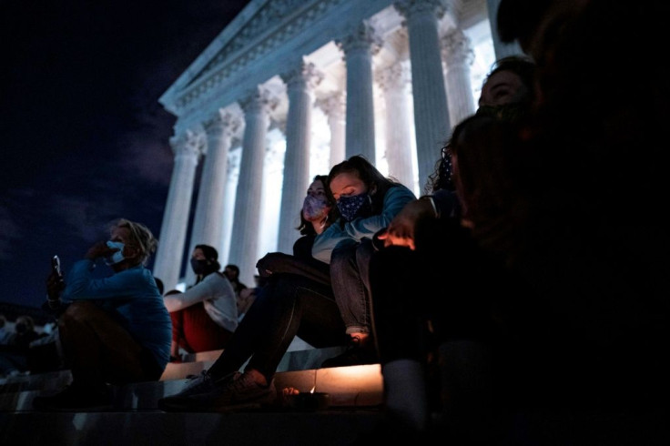 People gather before the Supreme Court on September 18, 2020 to pay homage to Ginsburg, just hours after her death was announced