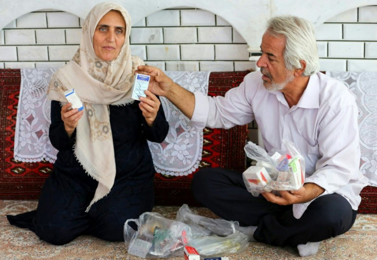 Leila Marouf Zadeh (left) helped survivors after the attack before being temporarily blinded, while her husband  Mohammad Zamani (right) remembers the stench of of "rotten garlic" from the gas -- both have health complications needing medication