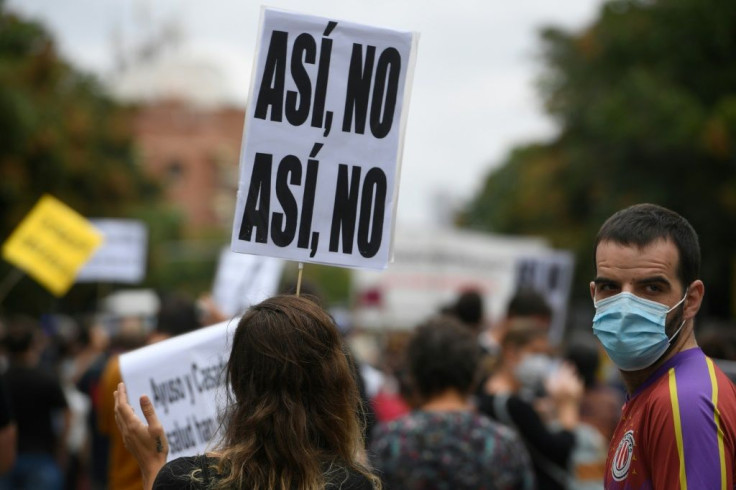 "Not like this" say demonstrators, aghast at new restrictions which will prevent them from leaving their district other than for essential travel