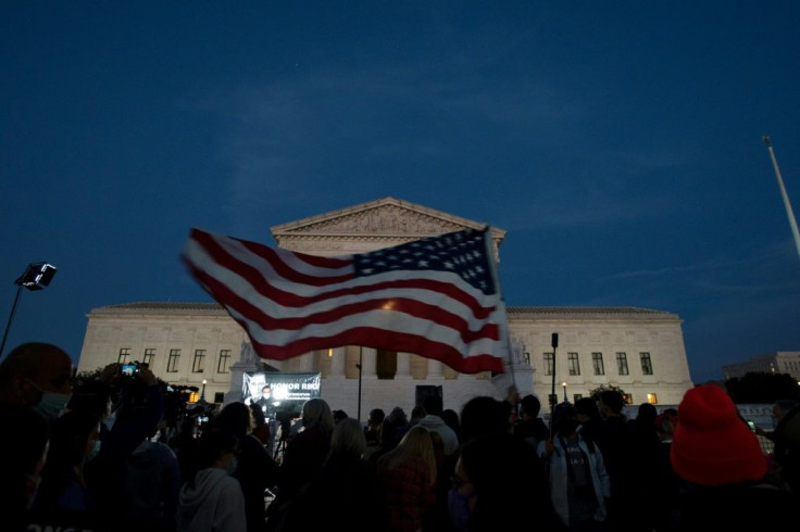 A US flag outside the Supreme Court in Washington as crowds gathered to pay respects to late justice Ruth Bader Ginsburg