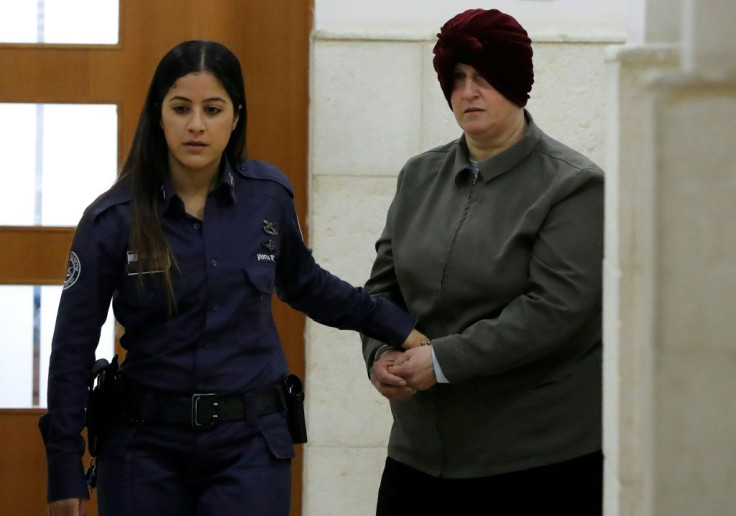 Malka Leifer, a former Australian school principal accused of dozens of cases of sexual abuse of girls, arrives for a February 2018 hearing at Jerusalem district court