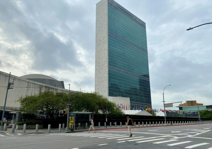 People walk on an empty First Avenue near the United Nations headquarters in New York on September 9, 2020.
