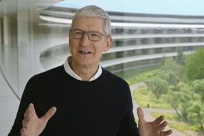 Apple CEO Tim Cook (pictured September 15, 2020 in an Apple Inc handout image) said that wildfires raging on the US West Coast, hurricanes slamming the South, and flooding in the Northeast and Mid-Atlantic make a compelling case for climate change