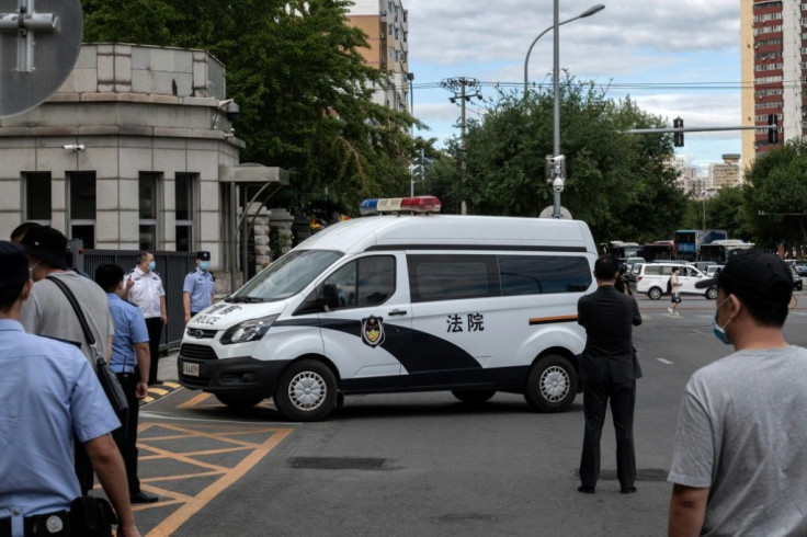 A police van carrying Ren Zhiqiang, a Chinese tycoon and outspoken critic of President Xi Jinping, arrives at court at the beginning of his trial earlier this month