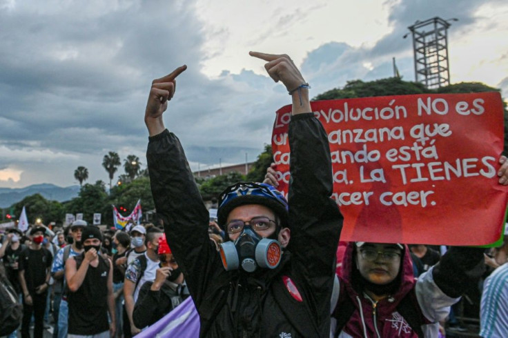 Demonstrators rallied in Medellin and cities across Colombia in protests against the government and police brutality following the death of a man at the hands of two police officers, who have been charged with torture and agravated homicide