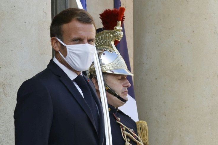 French President Emmanuel Macron, wearing a mask before a summit with his Slovenian counterpart, has urged a new dedication to the United Nations