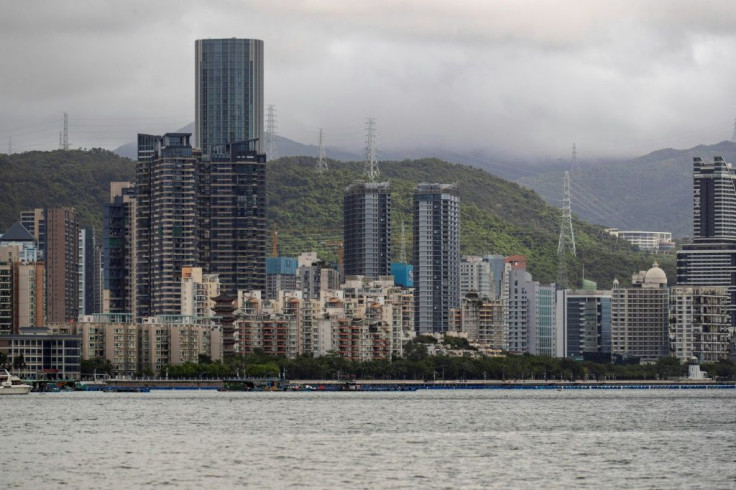 The mainland Chinese city of Shenzhen is seen from across the water in Hong Kong