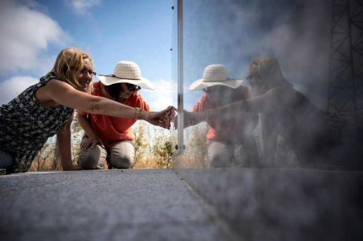 The Rivesaltes memorial stone with names carved into it, erected in front of the burial site, makes relatives feel their loved ones are no longer anonymous