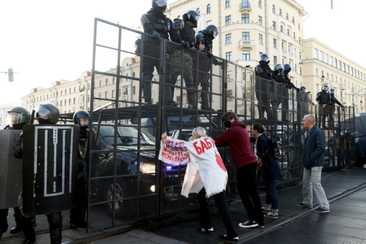 Protesters have defied security forces in rallies against the Belarus leader