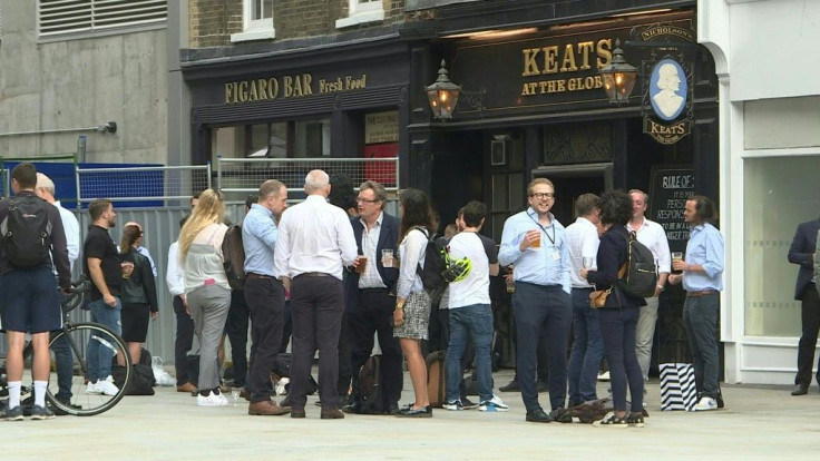 IMAGESWorkers in London go to the pub for drinks before new Covid restrictions, including early closing for pubs and obligatory table service, come into force.