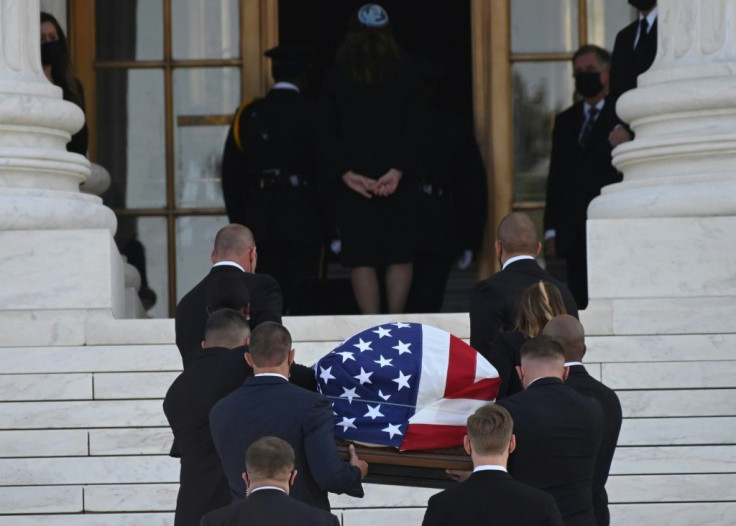 The flag-draped casket of the late US Supreme Court Justice Ruth Bader Ginsburg arrives at the US Supreme Court in Washington, DC