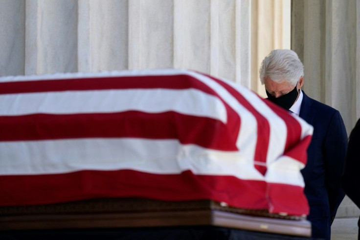 Former US President Bill Clinton pays his respects