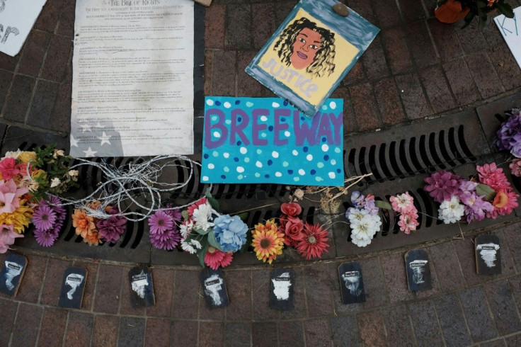 Signs placed at a memorial to Breonna Taylor at Jefferson Square Park in downtown Louisville, Kentucky