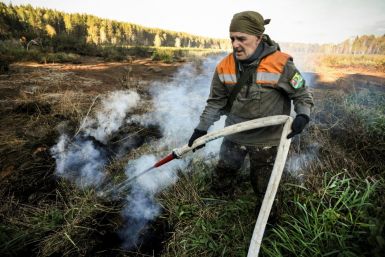 Water-resistant, underground peatland blazes in Russia's Arctic circle are "climate bombs", environmental activists say