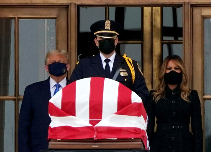 US President Donald Trump and First Lady Melania Trump pay their respects to the late justice Ruth Bader Ginsburg at the Supreme Court