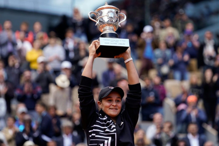 Ashleigh Barty poses with the trophy in 2019 after beating Marketa Vondrousova in the final