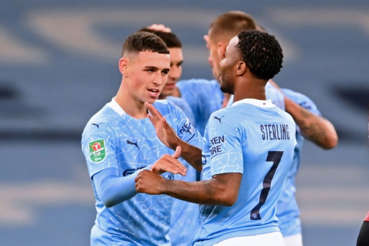 Phil Foden (left)scored the winner as Manchester City remained in contention for a fourth straight League Cup