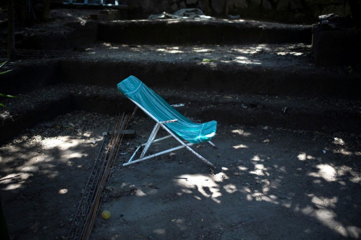 Salvadoran photojournalist Franklin Rivera is empty in his yard after he lost a battle with Covid-19