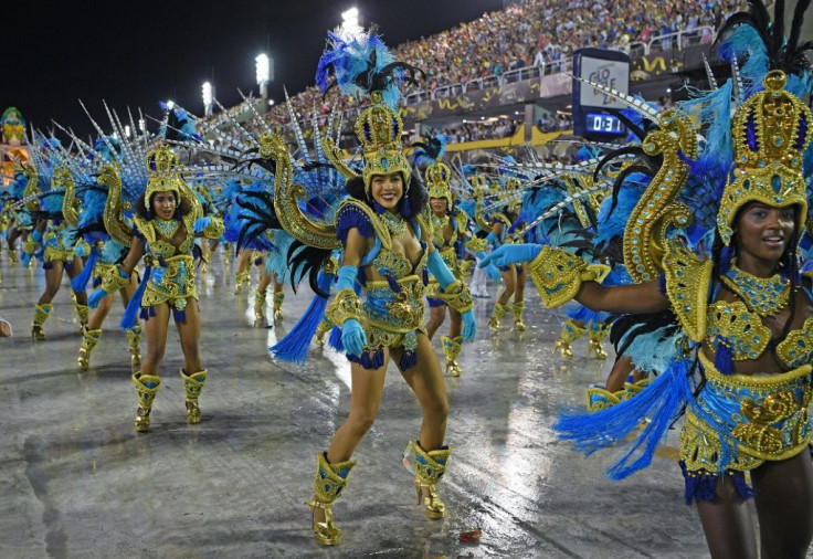 Rio's carnival, famous for its Samba dancers, drummers and dancing crowds, draws millions for all night parties in packed streets