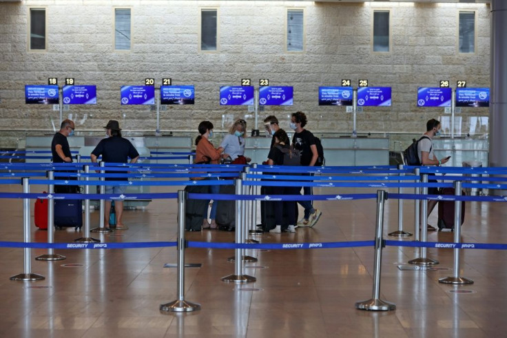 Passengers line up for check-in at Israel's Ben Gurion airport
