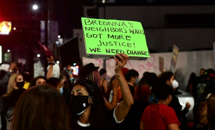 Critics -- including these protesters in Los Angeles on September 24, 2020 -- have decried the grand jury's decision to charge a police officer for endangering neighbors, but not for killing Breonna Taylor