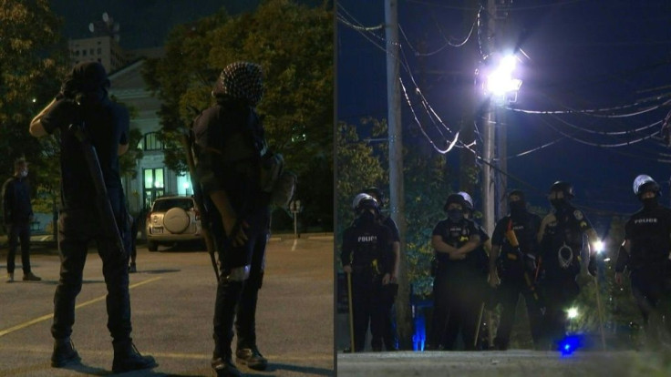 Dozens of protesters defying a second night of curfew seek refuge in a Louisville church, as the Kentucky city is gripped by racial justice protests over the lack of criminal charges in Breonna Taylor's killing by police.