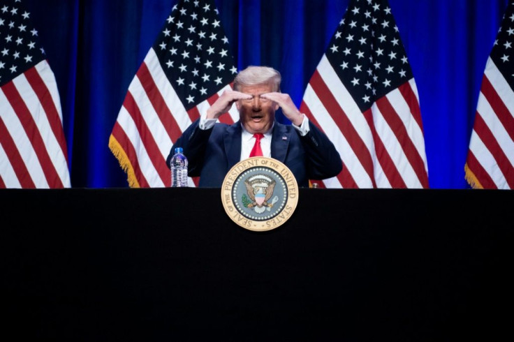US President Donald Trump, speaking at a roundtable event with Hispanic voters in Florida, said he serves as a wall "between the American dream and chaos"