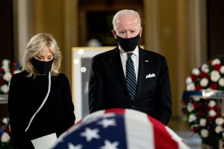 Democratic US presidential nominee Joe Biden, seen here paying respects at the casket of late Supreme Court justice Ruth Bader Ginsburg, has avoided hosting large rallies, opting instead for smaller campaign events and virtual appearances