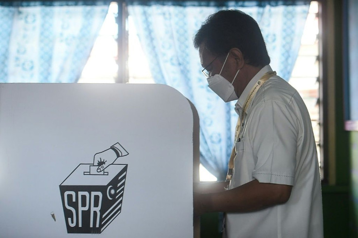 President of the Sabah Heritage Party, Shafie Apdal, votes during state elections in Sabah