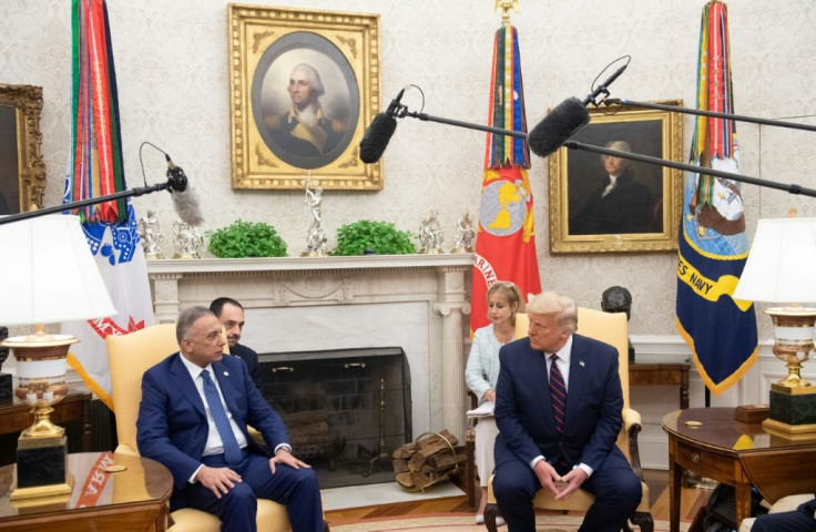 US President Donald Trump(R) meets with Iraqi Prime Minister Mustafa al-Kadhemi in the Oval Office of the White House in Washington on August 20